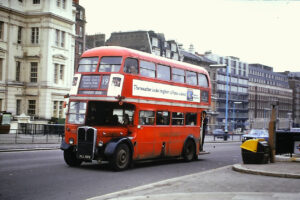 RT2882 at Hyde Park Corner, passing a BESI (Bus Electronic Scanning Indicator) beacon; 1975 [Graham Burnell]