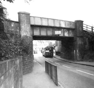 RF371 under the old bridge at Worcester Park, 1961 © Andrew Hicks