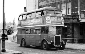 East End RTLs - MetCam RTL541 on the 108 is passing the Volunteer on the corner of Robin Hood Lane and East India Dock Road; this was the name of the original terminus on which RTLs on the 56 and 106 are standing in the background. © Fred Ivey