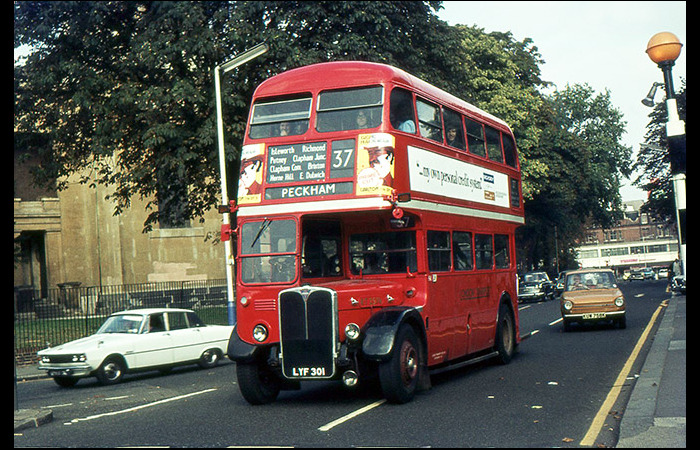 By September 1972, Stockwell’s remaining RTs were working only on route 168 on Monday to Friday, to be converted to one-man operation in August 1975. However, on 30 September 1972, by special arrangement, newly-repainted RT2576 ran a full rounder (Peckham to Hounslow) on duty SW28, almost 10 years after the introduction of Routemasters to the route. That special run is being celebrated on 1 October – 50 years and a day later – by the operation of RTs on today’s shortened 37 (Peckham to Putney), with feeder journeys from and to Hounslow. In Jim Owen’s photo from 1972, RT2576 passes though Brixton on its way to Peckham By September 1972, Stockwell’s remaining RTs were working only on route 168 on Monday to Friday, to be converted to one-man operation in August 1975. However, on 30 September 1972, by special arrangement, newly-repainted RT2576 ran a full rounder (Peckham to Hounslow) on duty SW28, almost 10 years after the introduction of Routemasters to the route. That special run is being celebrated on 1 October – 50 years and a day later – by the operation of RTs on today’s shortened 37 (Peckham to Putney), with feeder journeys from and to Hounslow. In Jim Owen’s photo from 1972, RT2576 passes though Brixton on its way to Peckham