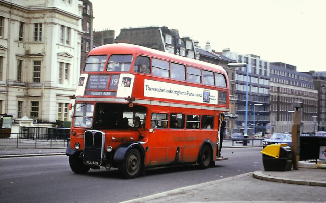 RT2882 at Hyde Park Corner, passing a BESI (Bus Electronic Scanning Indicator) beacon; 1975 [Graham Burnell]