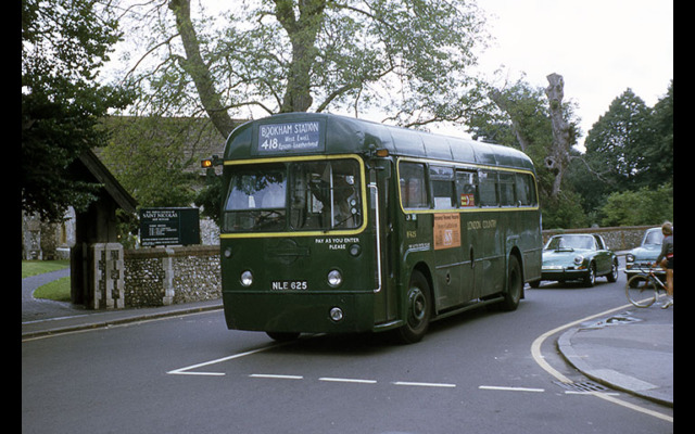 RF625 in LT green but with London Country fleetname passes St Nicholas church, Great Bookham, followed by a rather nice Porsche 911 Targa © Mike Harris RF625 in LT green but with London Country fleetname passes St Nicholas church, Great Bookham, followed by a rather nice Porsche 911 Targa © Mike Harris