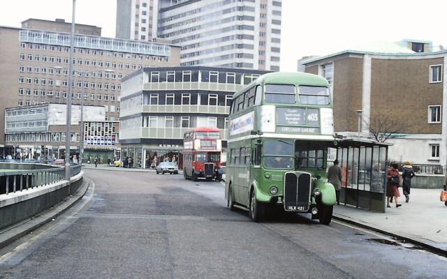 An RT on the 54 stands in the distance in Croydon, Fairfield Halls; a London Country RT on the 403 in front, in the ghastly NBC leaf green livery;1978.  © Graham Burnell An RT on the 54 stands in the distance in Croydon, Fairfield Halls; a London Country RT on the 403 in front, in the ghastly NBC leaf green livery;1978.  © Graham Burnell