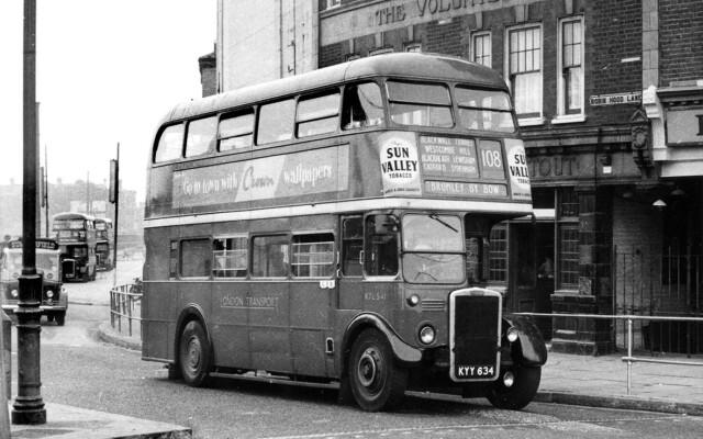 East End RTLs - MetCam RTL541 on the 108 is passing the Volunteer on the corner of Robin Hood Lane and East India Dock Road; this was the name of the original terminus on which RTLs on the 56 and 106 are standing in the background. © Fred Ivey East End RTLs - MetCam RTL541 on the 108 is passing the Volunteer on the corner of Robin Hood Lane and East India Dock Road; this was the name of the original terminus on which RTLs on the 56 and 106 are standing in the background. © Fred Ivey